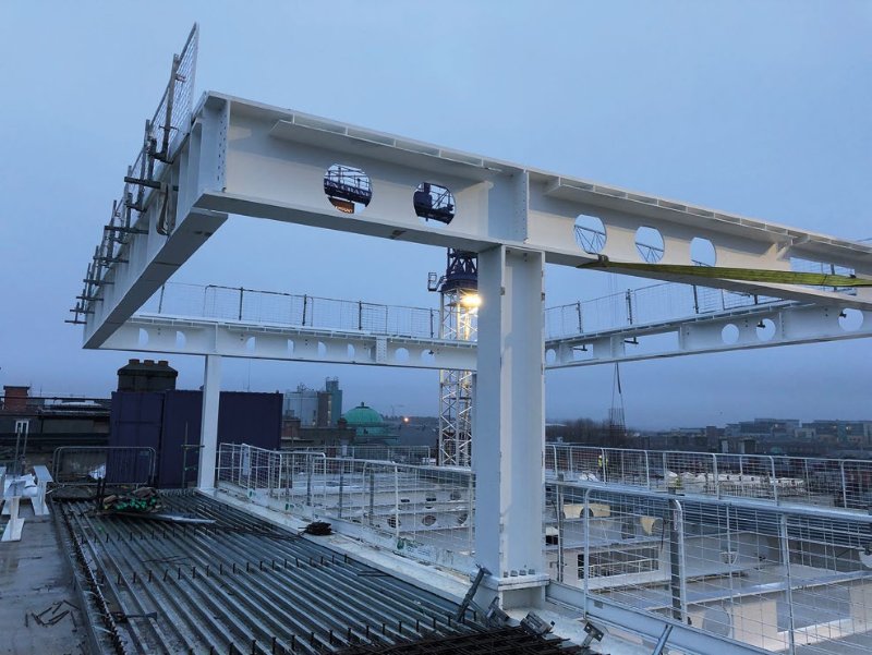 The new steel roof structure takes shape