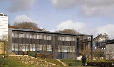 The side elevation is clad with brise soleil
