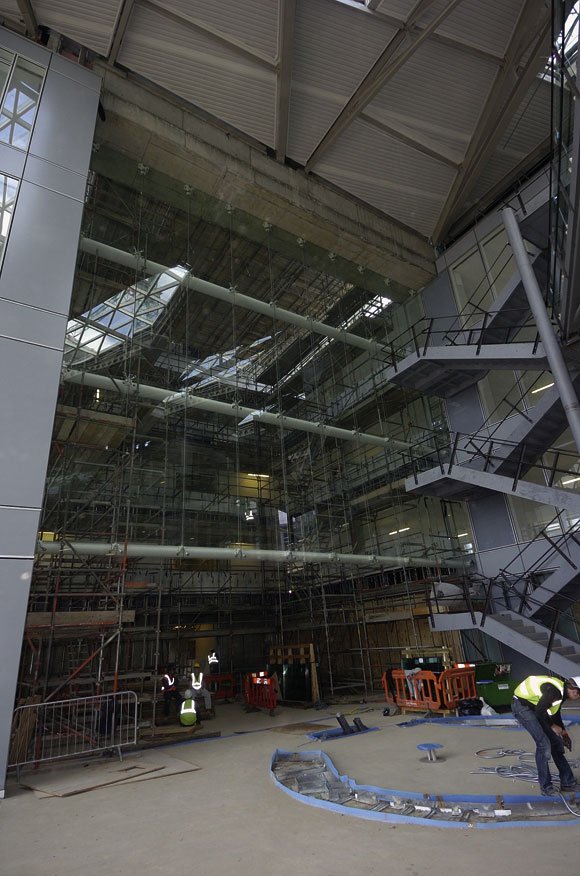 Steel footbridges span the cavernous interior