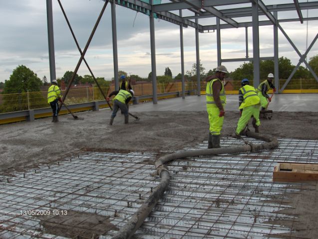 Concrete being poured onto a composite deck