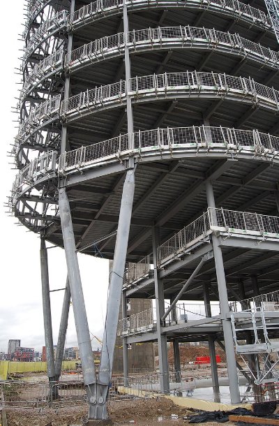 Twin pairs of V-shaped tubular columns support a cantilever
