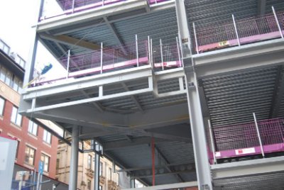 A large plate girder creates the column-free entrance
