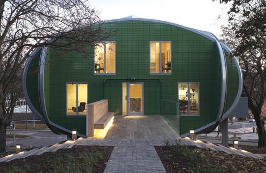 Entrance: each elevation is framed in an oval of steel