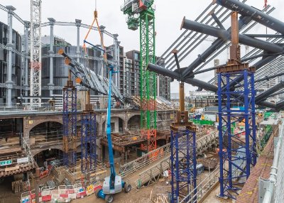 Each truss section is supported on temporary trestles
