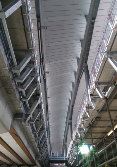 View of underside of bridge decks showing the mounting, known as the elephant’s ears, that support the platforms above