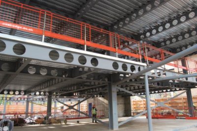 The first floor is set back to create a double-height space in the entrance foyer