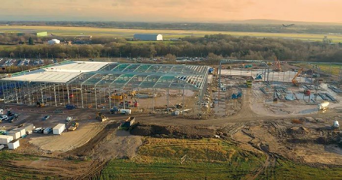 Steelwork erection began after a protection slab was installed over a fuel pipeline that runs under the site