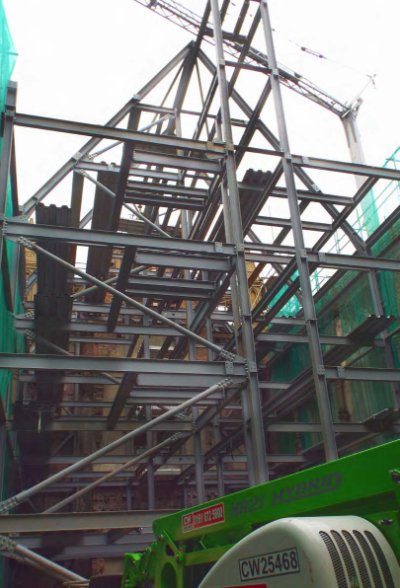An independent steel frame forms the apartments