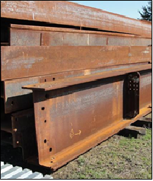 Reclaimed structural steel sections ready for reuse
