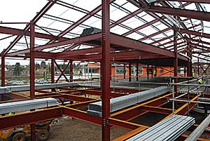 The main curved block has two floors and a plant level