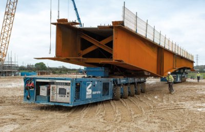 In order to be installed, bridge girders were tranported to the crane by SPMTs