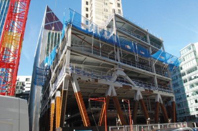 The ground floor trusses incorporate architectural V-shaped diagonal steel members