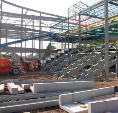 Steel rakers form seating areas for the drama hall