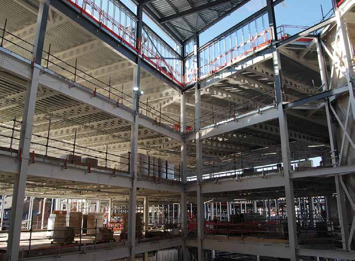The office features a central atrium
