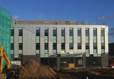 The three-storey high East Building was erected first