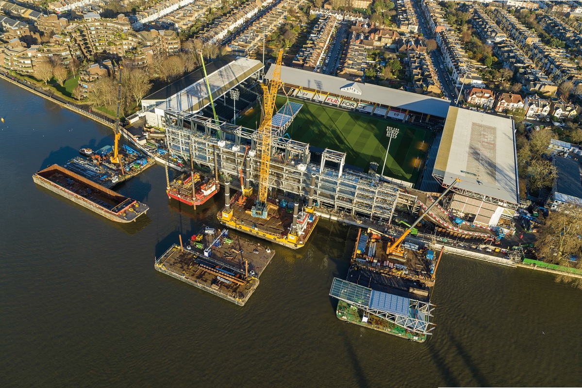 Roof trusses arrive by river transport and are lifted into place by a 400t-capacity crane positioned on a jack-up barge