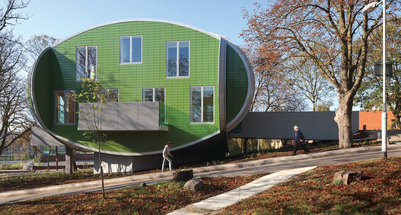 Maggie’s Nottingham occupies a sloping site in a secluded part of the hospital grounds