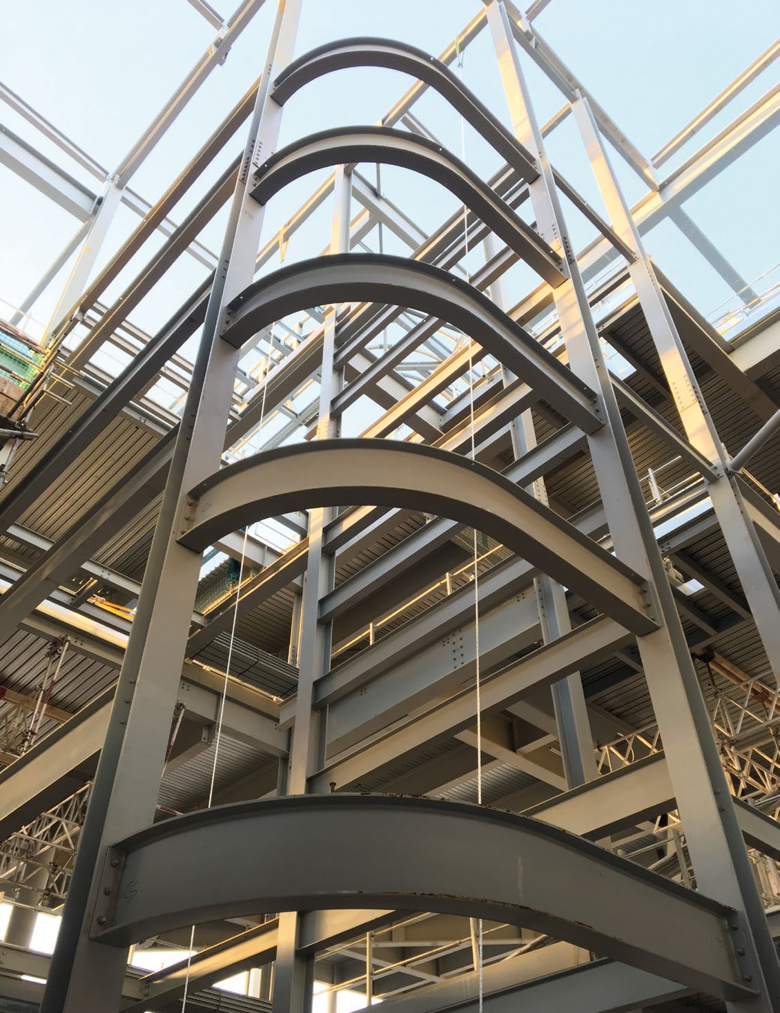 Curved members form the internal façade of the hub