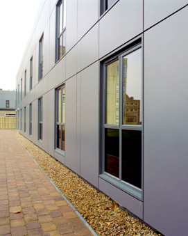 Large colour coated steel cassette panels supported on vertical rails