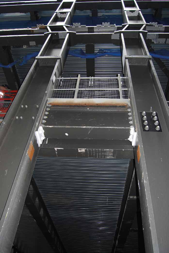 The western elevation&#39;s ladder frames have a kink at second floor level to accommodate the changing profile of the cladding