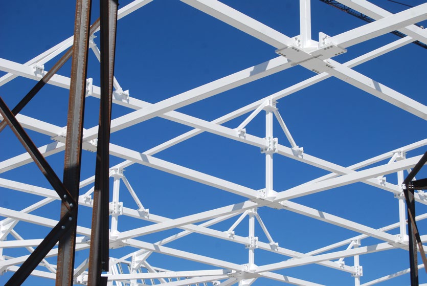 Roof trusses spanning the football pitch