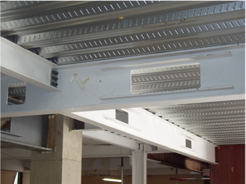 Stiffened, large rectangular web opening in a steel beam