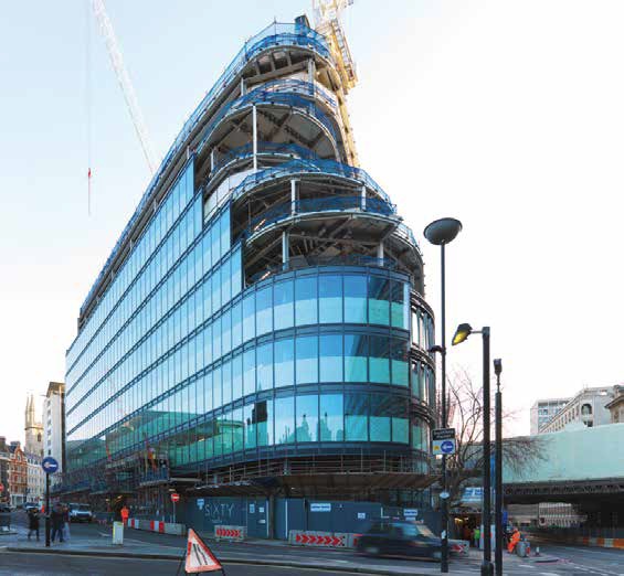 The project occupies a prominent site on a busy City junction