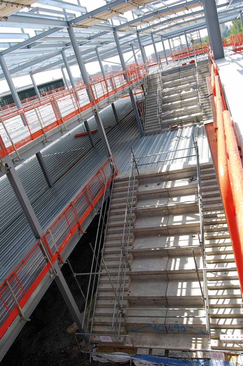 An atrium and main staircase are located in the middle of the classroom block