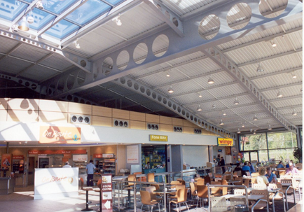 Structurally efficient cellular steel beams used to create flexible, column-free space at this motorway service station