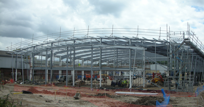 Curved single span portal frame for a superstore in Guildford