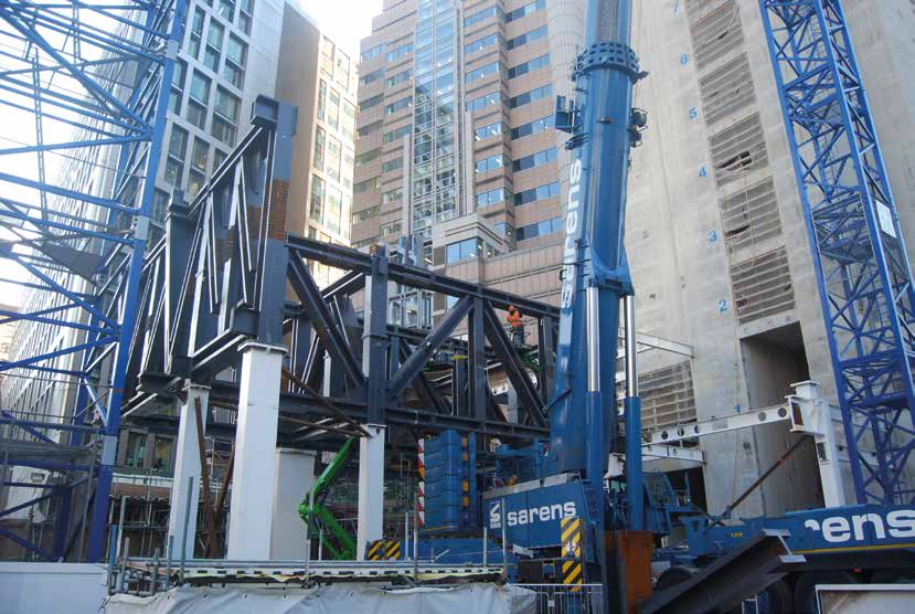 Storey-high trusses support 2 London Wall Place’s cantilever over the adjacent road