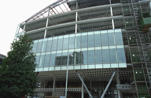Unitised curtain walling system attached to a steel framed building in Spinningfields, Manchester