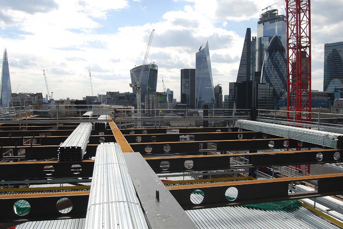 Steel supports metal decking to form the composite floors