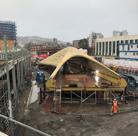 The bridge was delivered to site in pieces, consisting of four deck plates, six roof sections and 11 side panels