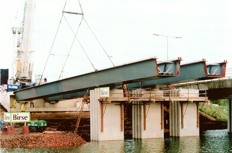 Open trapezoidal composite box girder during construction