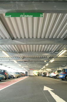 Use of colour-coated composite decking in a car park