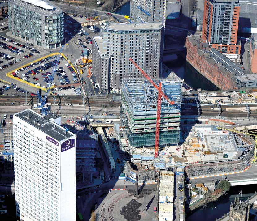 Building 101 nears completion, while the transfer deck is in place for Building 100