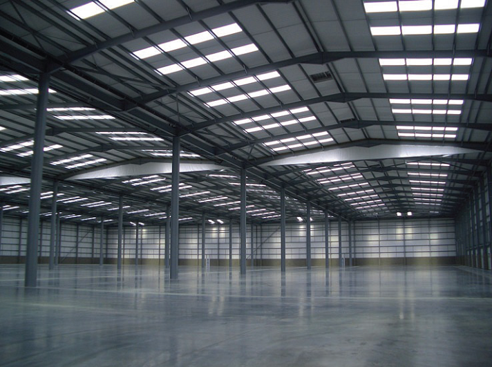 Mid-slope rooflights providing natural lighting in a distribution warehouse