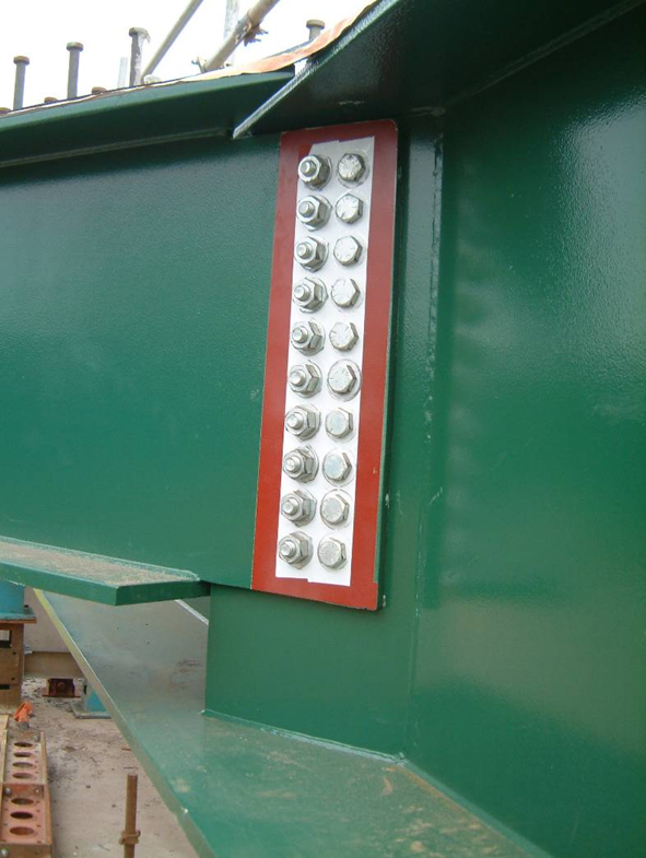 Cross girder to trimmer girder connection in a skew bridge
(inner bolts could only be inserted with head on open face)