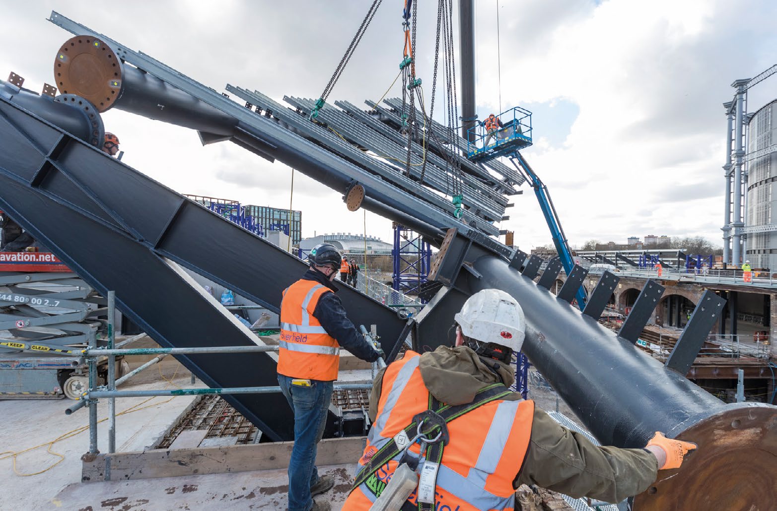 Eight individual and bespoke truss sections are lifted into place