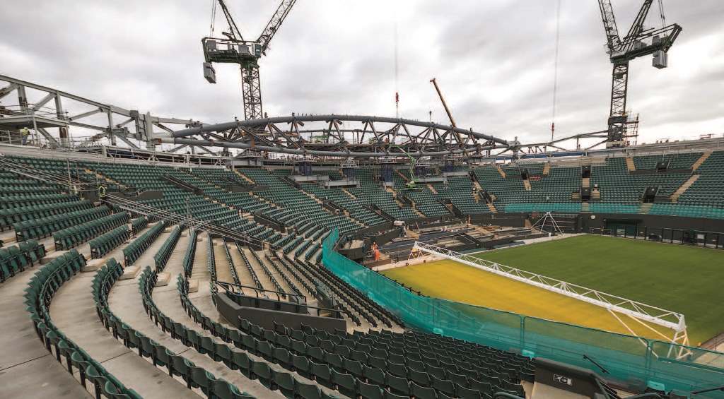 Five trusses that support the retractable roof trusses surround the court
