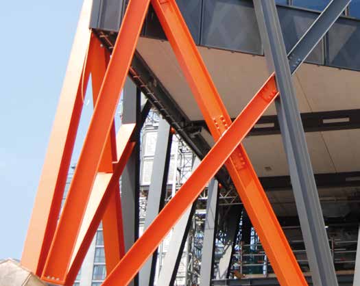 Orange steelwork highlights the main entrance