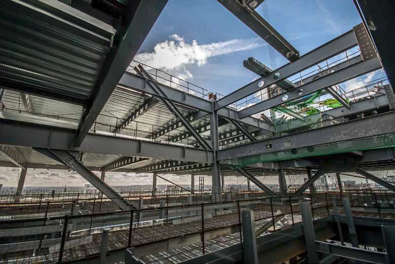 A steel frame supporting [https://www.tatasteeleurope.com/construction/products/flooring/composite-floor-deck/comflor-80 Tata Steel’s ComFlor 80] metal decking offered the required lightweight solution