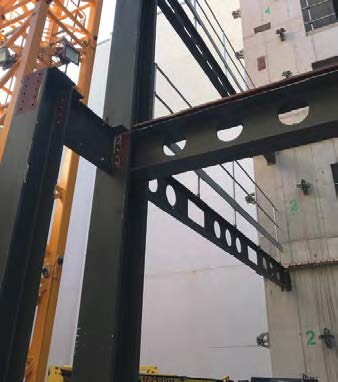 Steelwork connects to the core and the retained façade