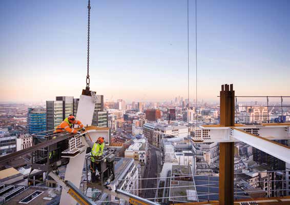 No time to take in the view as steel erectors complete a bolted connection