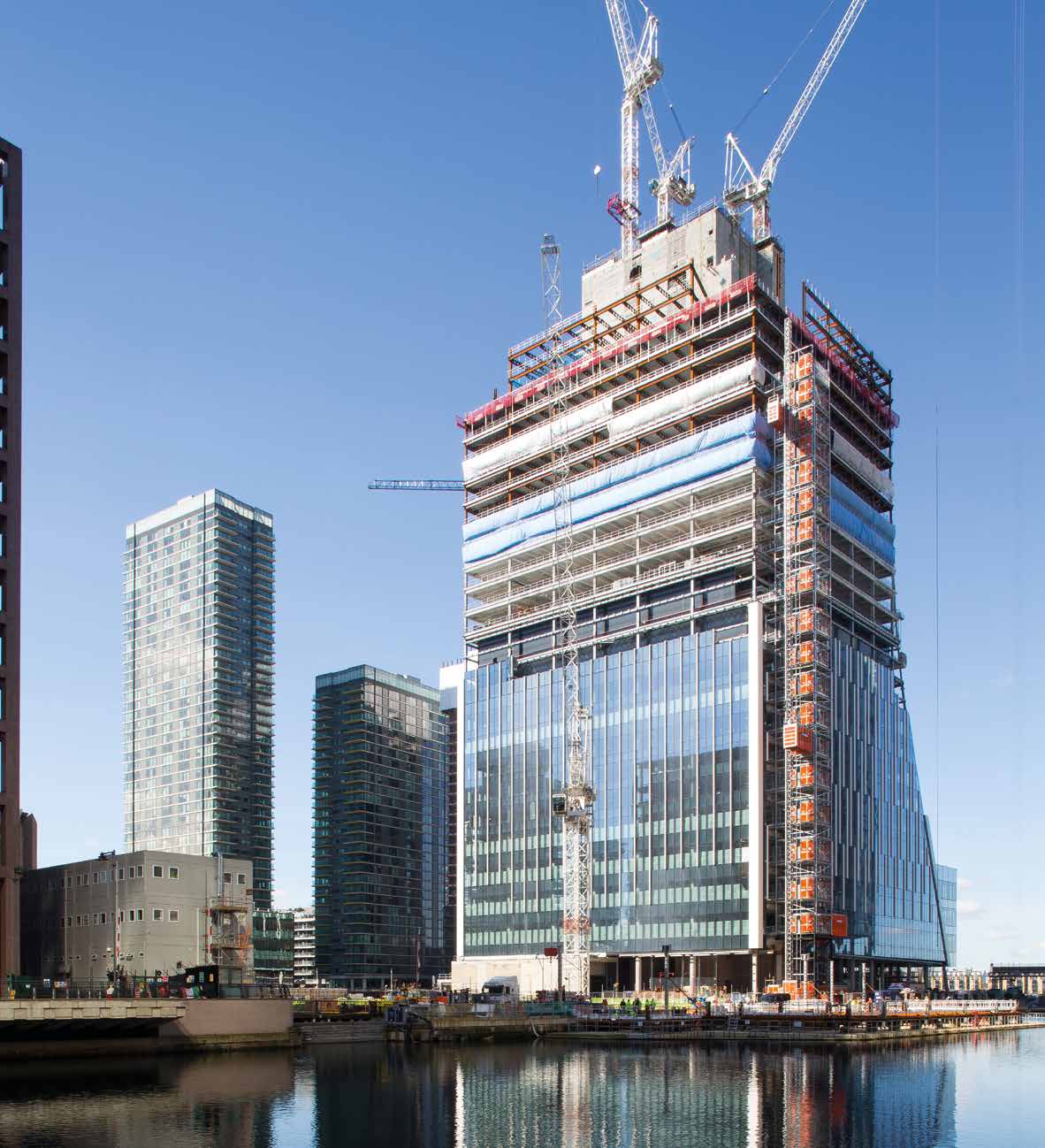 The sloping façade overlooks the River Thames