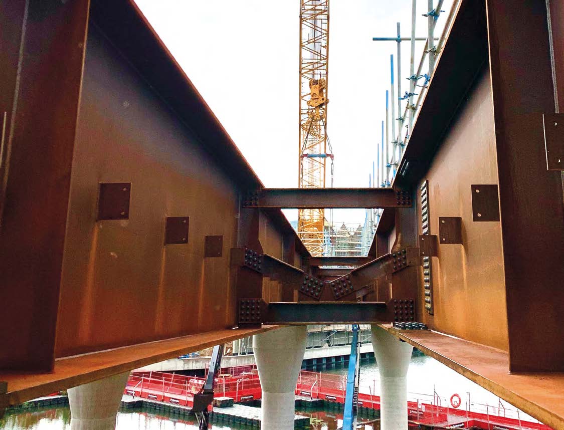 The bridge is a two-span weathering steel structure