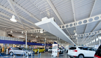 Curved cellular beams used in a car showroom