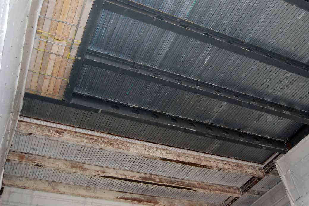 New composite flooring abutting existing flooring