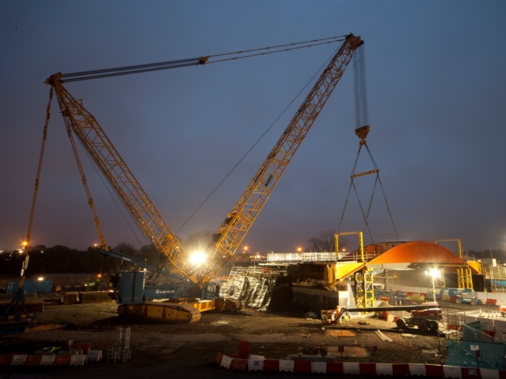 A crawler crane installing L01 Bridge at Olympic Park, London (Image courtesy of Mabey Bridge Ltd.)